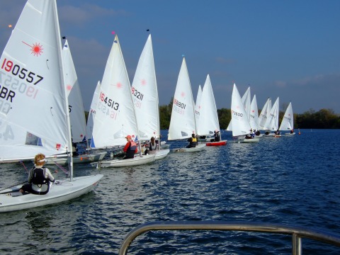 40 Lasers of all types for the Burghfield open photo copyright Peter Blackman taken at Burghfield Sailing Club and featuring the ILCA 7 class