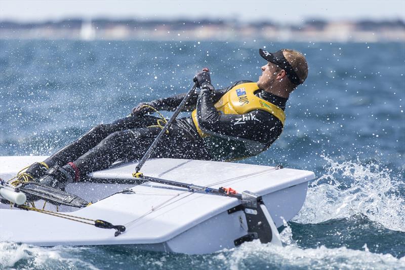 Tom Burton on day 2 at ISAF Sailing World Cup Hyères photo copyright Beau Outteridge taken at COYCH Hyeres and featuring the ILCA 7 class