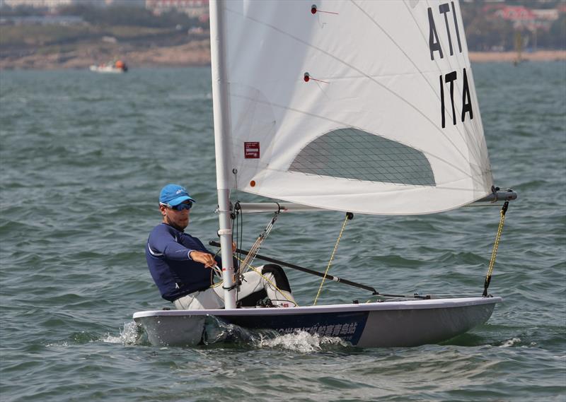 Giovanni Coccoluto on Sailing World Cup Qingdao day 2 photo copyright Daniel Smith taken at  and featuring the ILCA 7 class