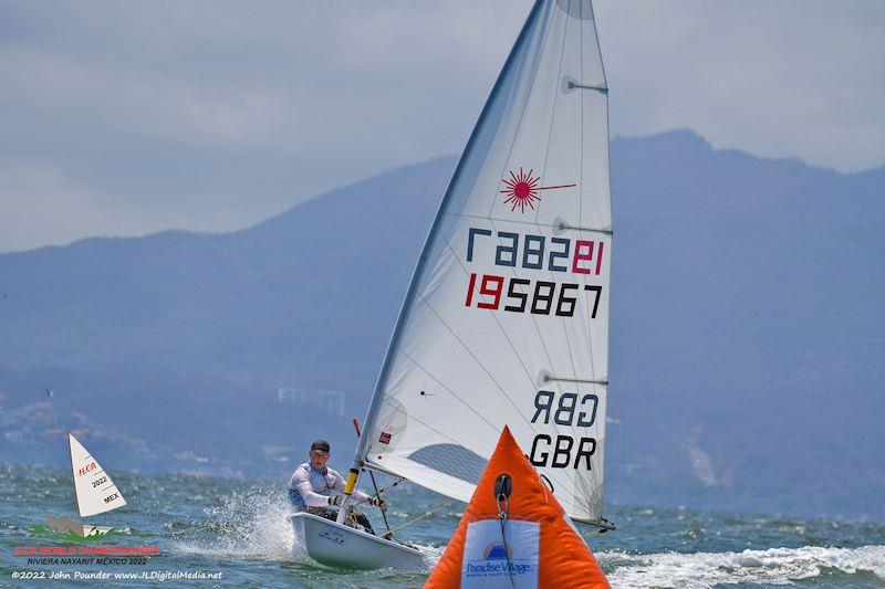 Great-Grand Master World Champion Tim Law in the ILCA 7 Masters Worlds in Mexico photo copyright John Pounder / www.jldigitalmedia.net taken at Vallarta Yacht Club and featuring the ILCA 7 class