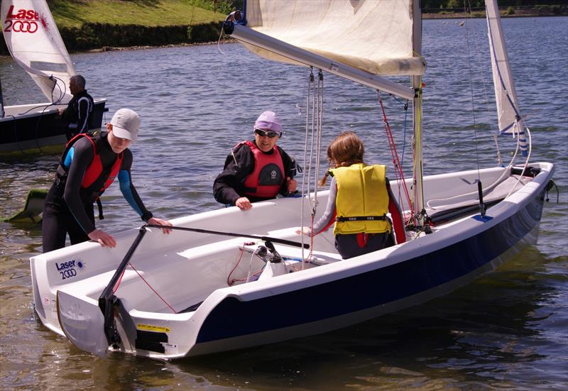Sarah Green organises Wil Smith and Cerys Norville on board as Llandegfedd Sailing Club Push the Boat Out photo copyright Andy Howard taken at Llandegfedd Sailing Club and featuring the 2000 class