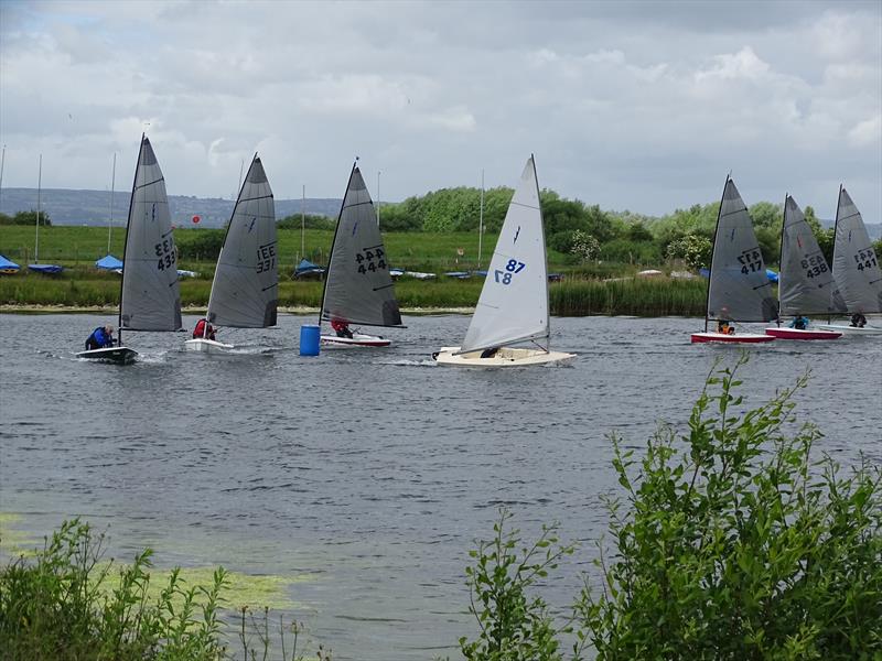 Ceri James rounds a mark ahead of John Butler and a gaggle of Lightnings during the Lightning 368 Northern Championship at Shotwick Lake photo copyright Richard Stratton taken at Shotwick Lake Sailing and featuring the Lightning 368 class