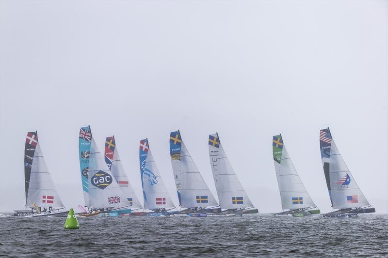 Eight boats on the starting line on day 1 of the M32 Series at Helsinki photo copyright Aston Harald / M32 Series taken at  and featuring the M32 class