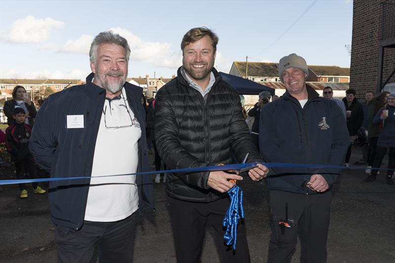 Alex Thomson cuts the ribbon with John Gillard and Paul O'Grady of Oarsome Chance - photo © Duncan Shepherd for Oarsome Chance