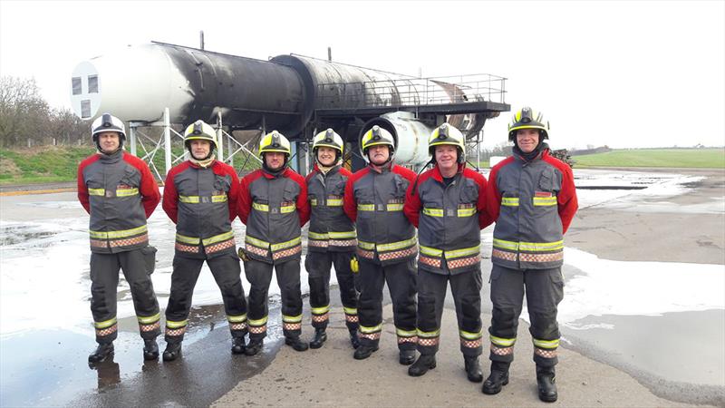 Bex Sims (centre) and 'White Watch', Ashfield Fire Station, Nottinghamshire Fire and Rescue Service at East Midlands Airport for training exercise. - photo © Clipper Race