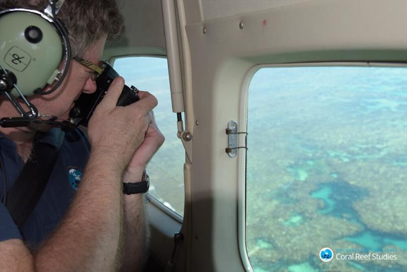 Lead author, Prof Terry Hughes,conducting an aerial survey along the Great Barrier Reef during the 2017 bleaching event.The surveys covered more than 8,000 km (5,000 miles). - photo © ARC CoE for Coral Reef Studies / James Kerry