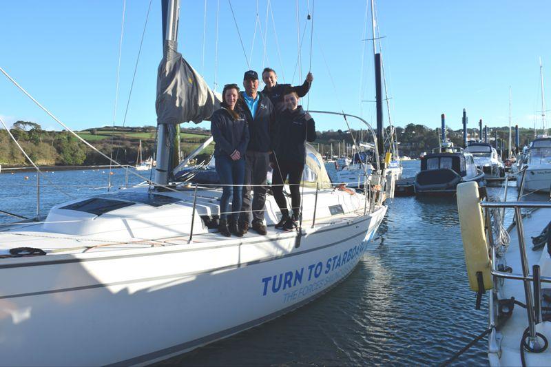 AZAB Race Director Ian Munday (centre) with Turn to Starboard team members Tamsin Mulcahy, Steve Richards and Izzy Galloway on board the charity's training yacht ‘Bluster' photo copyright Turn to Starboard taken at Royal Cornwall Yacht Club