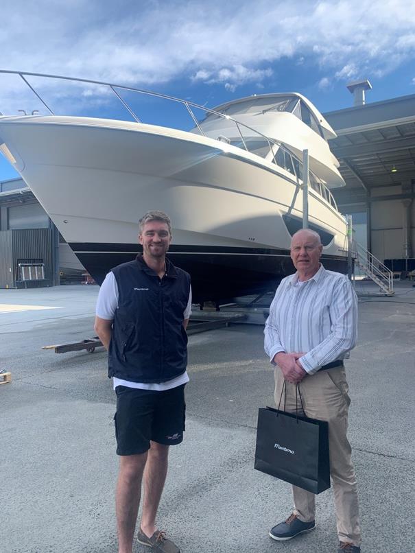 Mike is shown being farewelled by Maritimo's lead designer Tom Barry-Cotter photo copyright Maritimo taken at 
