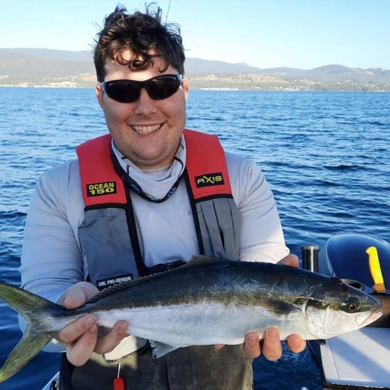 Angus Finally breaks the drought with a Kingfish - photo © Spot On Fishing Hobart
