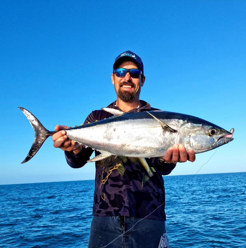 Adrian with a nice longtail caught on the old faithful Zman 5` Streakz in bubblegum photo copyright Fisho's Tackle World taken at 