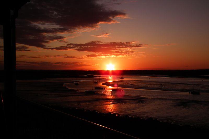 Maylandsea Bay SC treats visitors to a beautiful sunset photo copyright Neil Raven taken at Maylandsea Bay Sailing Club