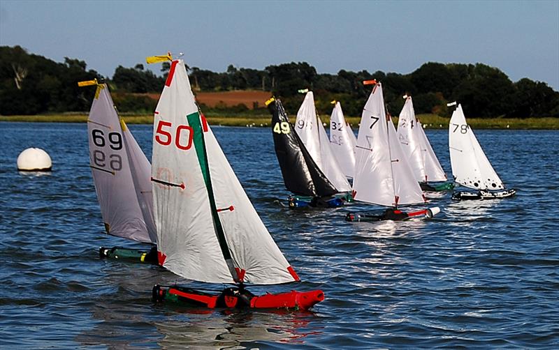 A good start by the whole fleet during the 2018 Bottle Boat Championship at Waldringfield photo copyright Roger Stollery taken at Waldringfield Sailing Club and featuring the Model Yachting class