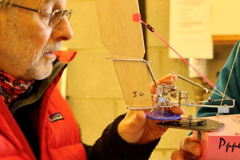 Mervyn Cook adjusting the vane gear of a model yacht photo copyright Jacque Cook taken at  and featuring the Model Yachting class