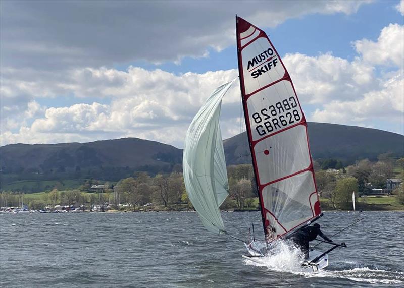 Danny Boatman mid-gybe in the Musto Skiffs during the Ullswater Daffodil Regatta photo copyright Steve Robson taken at Ullswater Yacht Club and featuring the Musto Skiff class