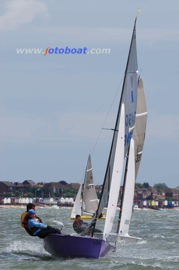 Racing during National 12 Burton Week at Thorpe Bay photo copyright Richard Janulewicz / www.fotoboat.com taken at Thorpe Bay Yacht Club and featuring the National 12 class
