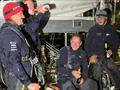 Skipper Tapio Lehtinen looks at his young crew with pride