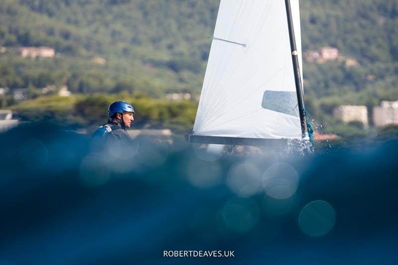 Phil Coveny on day 2 of the OK Dinghy Europeans in Bandol photo copyright Robert Deaves / www.robertdeaves.uk taken at Société Nautique de Bandol and featuring the OK class
