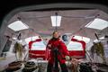 British skipper Sam Davies on Imoca Initiatives Coeur is pictured during training, on April 17, off Lorient, France