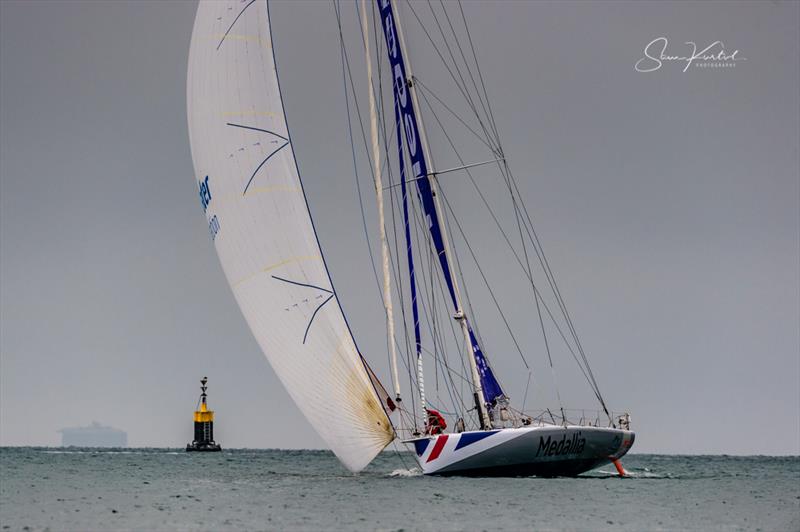 Lonely Rock Race start in the Solent photo copyright Sam Kurtul / www.worldofthelens.co.uk taken at  and featuring the IMOCA class