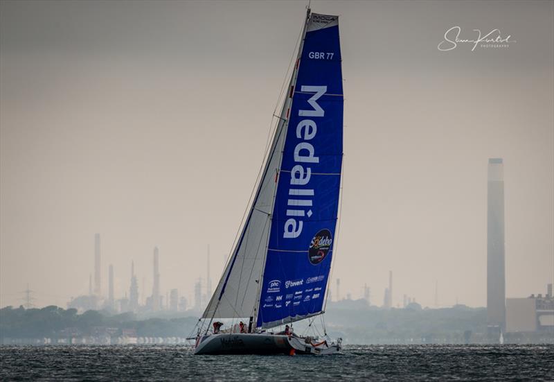 Lonely Rock Race start in the Solent photo copyright Sam Kurtul / www.worldofthelens.co.uk taken at  and featuring the IMOCA class