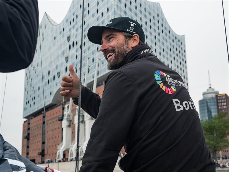 Boris Herrmann in front of the Elbhilharmonie as he arrived in Hamburg photo copyright Antoine Auriol taken at  and featuring the IMOCA class