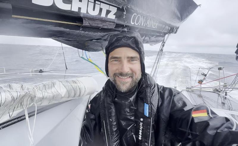 Mission accomplished! Boris Herrmann smiling into the camera after deploying a weather buoy during The Transat CIC race photo copyright Boris Herrmann / Team Malizia taken at  and featuring the IMOCA class