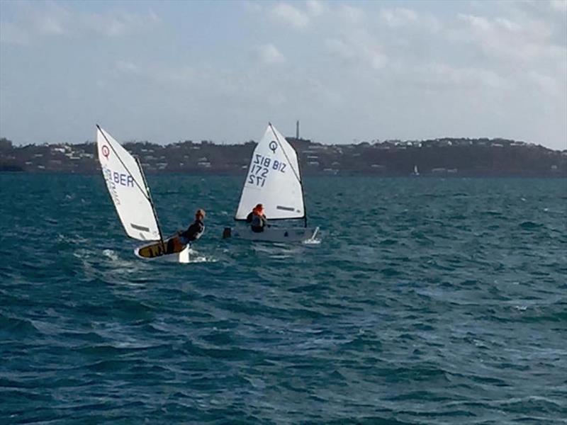 Caroline Sersland (Belize) duelling  Cole Summerset (Bermuda) in the Bermuda Optimist National Championship photo copyright BSC taken at Royal Bermuda Yacht Club and featuring the Optimist class