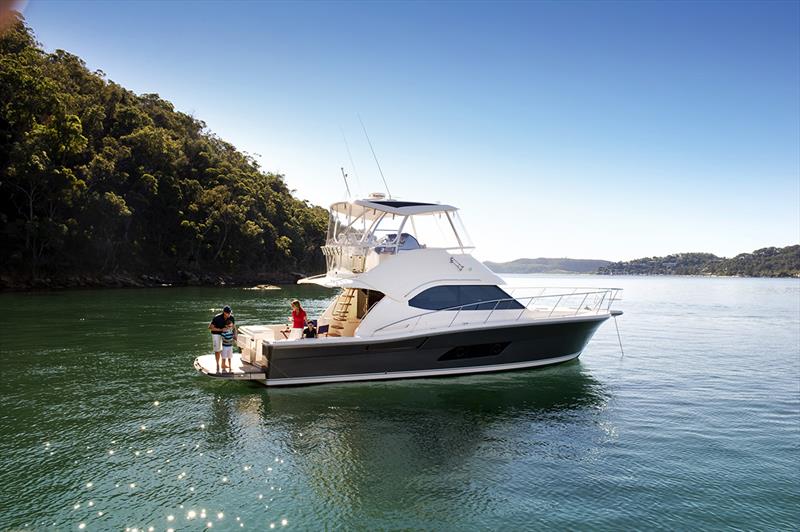 Relaxing in a secluded bay aboard the Riviera 43 Open Flybridge photo copyright Riviera Australia taken at  and featuring the Power boat class
