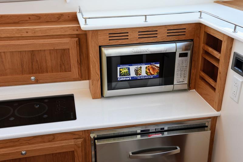 Microwave moved to countertop level for easier access – Silverware drawer in top drawer where microwave used to be - photo © Jamie Governale