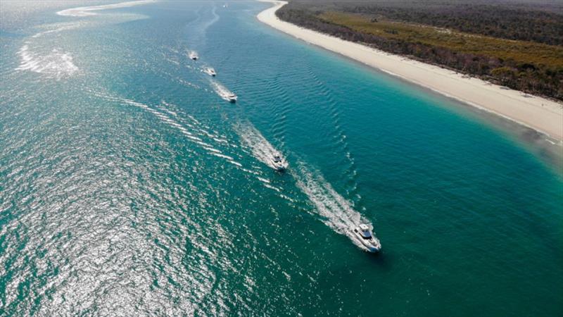 The Riviera fleet, led by the R Marine Jones team, heading north to Fraser Island for the Great Sandy Strait Experience photo copyright Riviera Australia taken at  and featuring the Power boat class