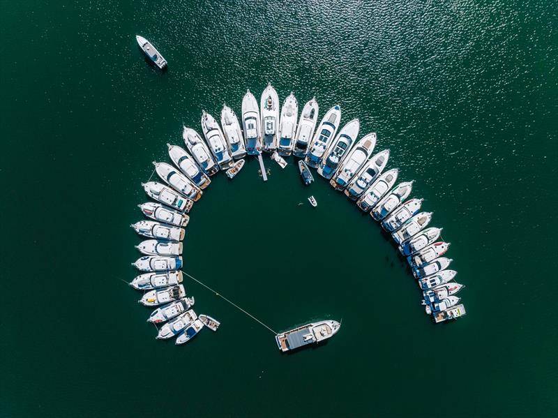 The spectacular sight of 33 Riviera motor yachts rafting up on Perth's Swan River photo copyright Riviera Australia taken at  and featuring the Power boat class
