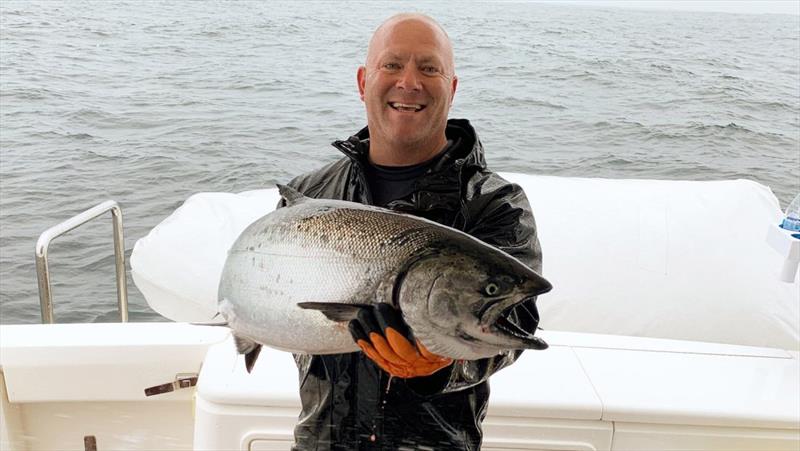 Travis Holt, a keen fisher, with some of the ‘tremendous bounty' to be found in Alaskan waters aboard his 545 SUV photo copyright Riviera Australia taken at  and featuring the Power boat class