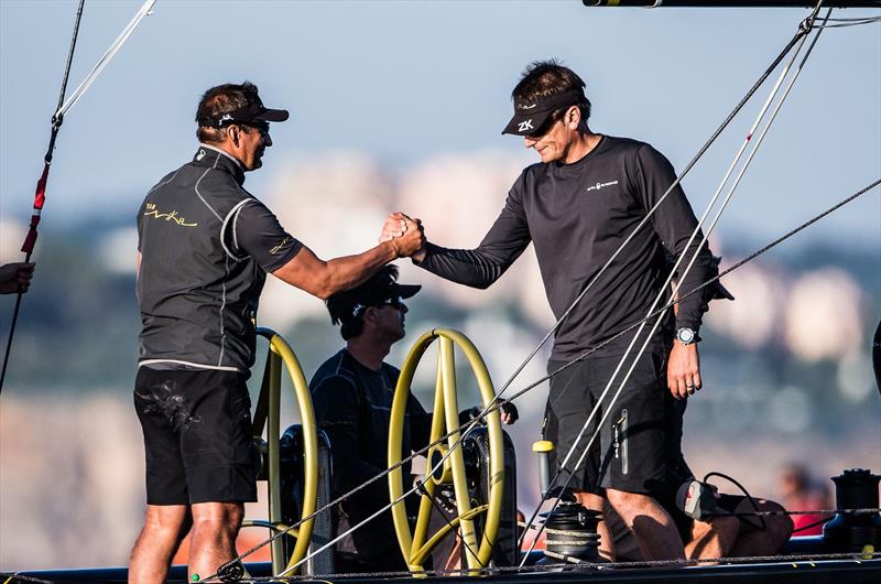 Vladimir Prosikhin (left) and Dean Barker (right) congratulate each other on a race win on the first day of fleet racing at the RC44 Cascais Cup - photo © Pedro Martinez / Martinez Studio