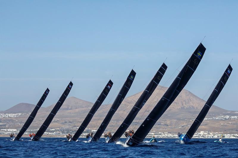 Racing against the backdrop of the Canary Island's famously barren terrain on day 1 of the RC44 Calero Marinas Cup photo copyright Martinez Studio / RC44 Class taken at  and featuring the RC44 class