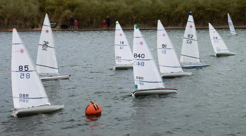 Dave Fowler (840), 2015 National Champion, makes a champions start at the RC Laser Northern Championship photo copyright Robert Wheeler taken at Fleetwood Model Yacht Club and featuring the RC Laser class