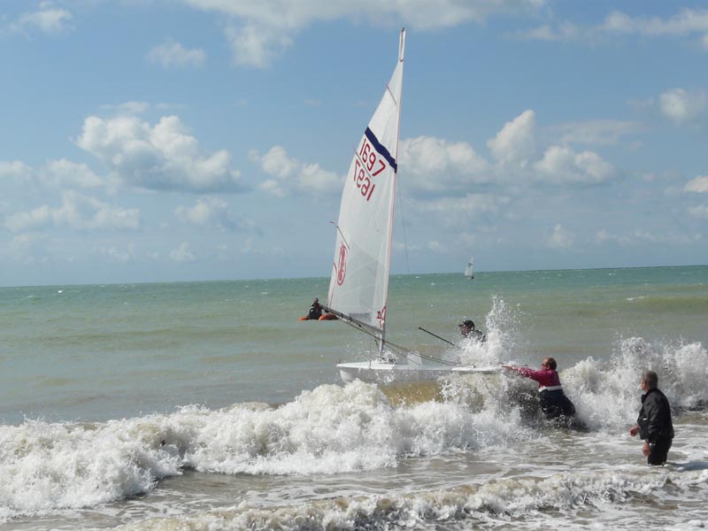 Launching in the surf during the Streaker nationals at Lancing photo copyright Isabelle Jackson taken at Lancing Sailing Club and featuring the  class