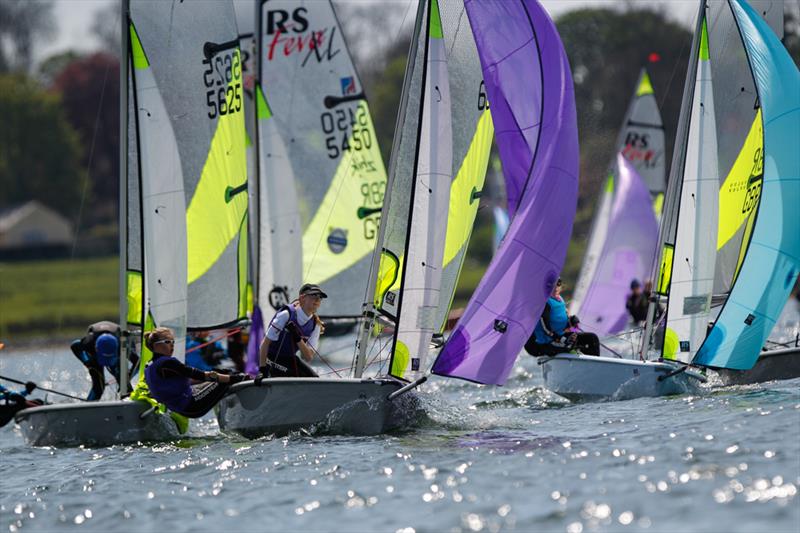 Feva fleet heading downwind on day 2 of the RYA Eric Twiname Championships photo copyright Paul Wyeth / RYA taken at Rutland Sailing Club and featuring the RS Feva class