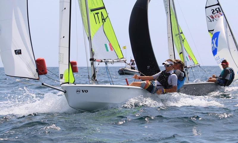 Day 1 of the RS Feva World Championships in Follonica photo copyright Elena Giolai / Fraglia Vela Riva taken at Gruppo Vela L.N.I. Follonica and featuring the RS Feva class