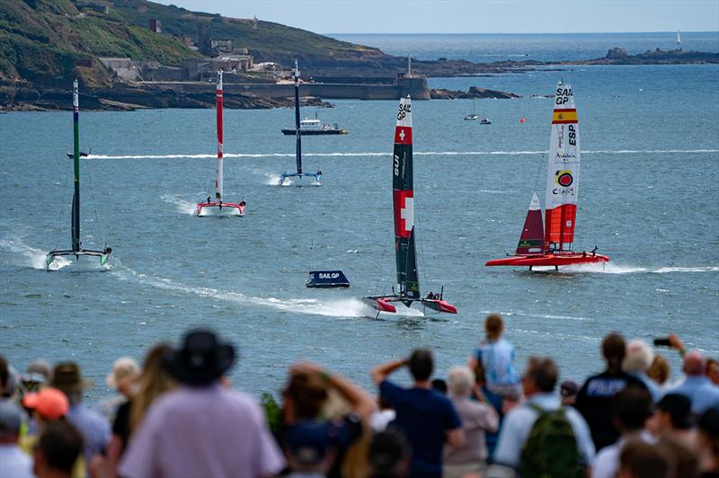 Spectators watch the fleet in action on Race Day 1 of the Great Britain Sail Grand Prix | Plymouth in Plymouth, England photo copyright Jon Super for SailGP taken at  and featuring the  class