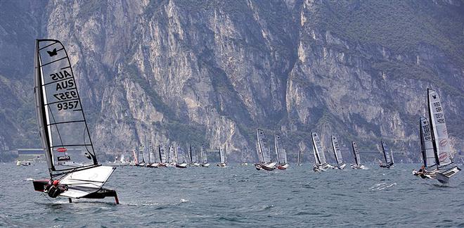 Port tacking the fleet on the start line during the 2007 Moth World Championships on Lake Garda. Bet you want some of that experience coaching you and your crew.  © Oskar Kilbhorg