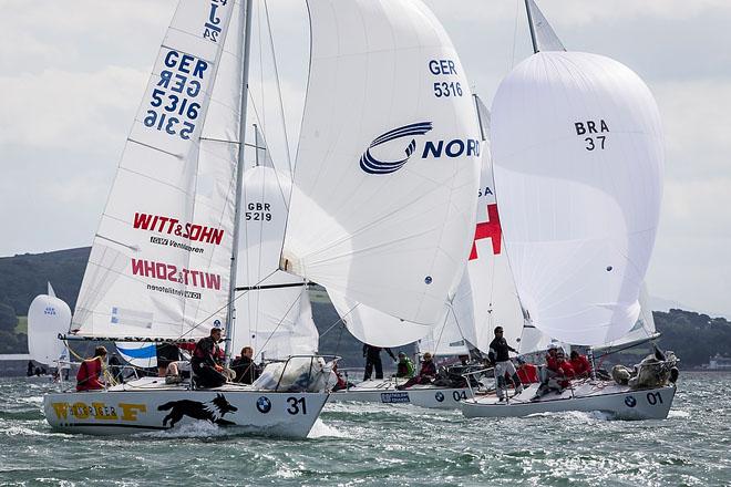 Howth Yacht Club, Co. Dublin, Ireland; Wednesday 28th August 2013: Event leader Mauricio Santa Cruz (right) leads a group of boats in race 4 of the BMW J24 World Championships at Howth Yacht Club. © David Branigan/Oceansport http://www.oceansport.ie/