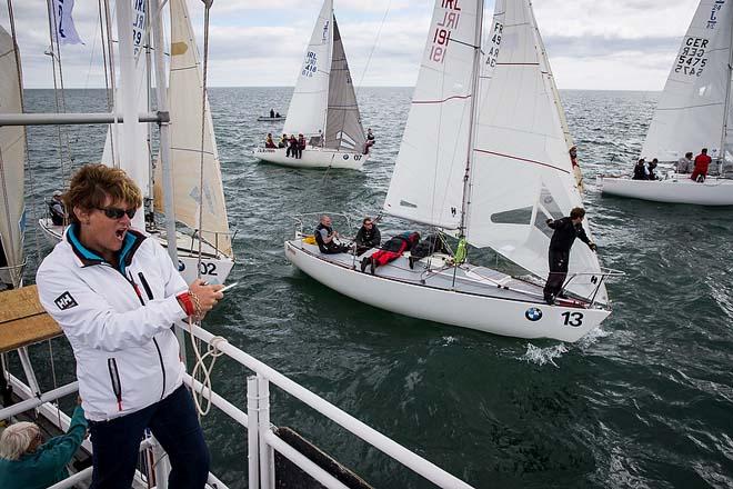 Howth Yacht Club, Co. Dublin, Ireland; Thursday 29th August 2013: Race Officer Judith Malcolm signals the start of a race during the penultimate day at the BMW J24 World Championships at Howth Yacht Club where 40 boats from ten nations are competing. © David Branigan/Oceansport http://www.oceansport.ie/