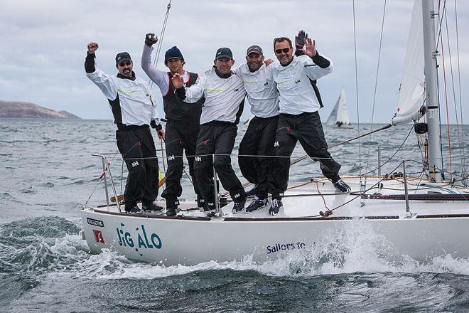 Howth Yacht Club, Co. Dublin, Ireland; Friday 30th August 2013: Tim Healy (left) and the crew of Helly Hansen from Sail Newport (USA) on their way to overall victory on the final day of the BMW J24 World Championships at Howth Yacht Club. © David Branigan/Oceansport http://www.oceansport.ie/