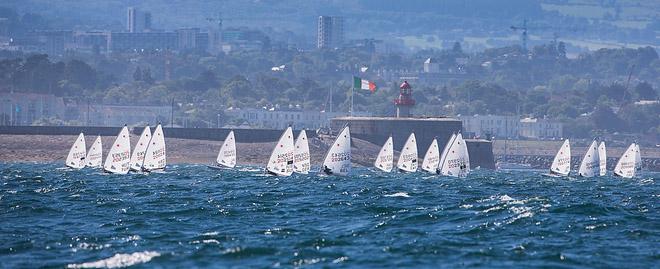National Yacht Club, Co. Dublin, Ireland; Tuesday 3rd September 2013: The Yellow Laser Radial flight passing close to shore on the final day of qualifier races at the Laser European World Championships at the National Yacht Club. © David Branigan/Oceansport http://www.oceansport.ie/