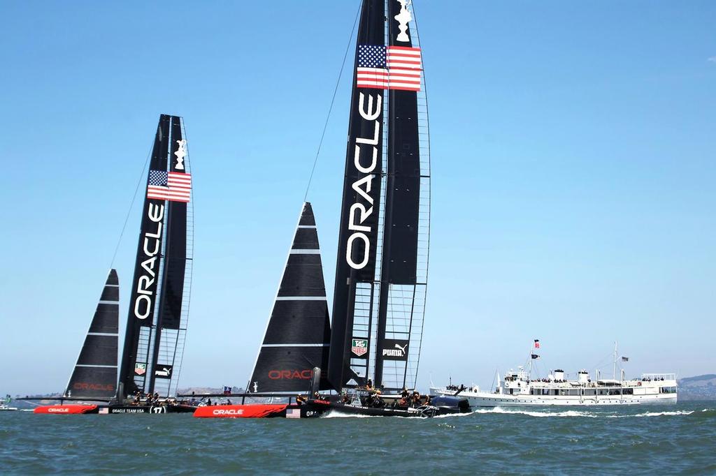 With US President Roosevelt’s yacht Potomac in the background, Oracle one and two move off.  - America’s Cup 2013 © Chuck Lantz http://www.ChuckLantz.com