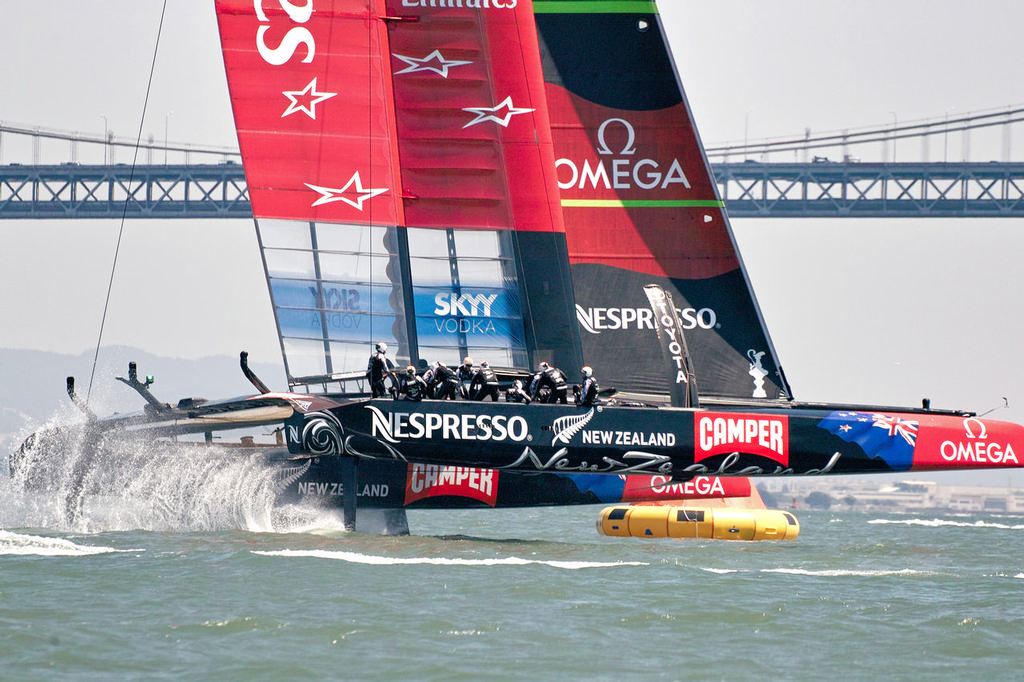 Emirates Team NZ crosses the finish line in race 5. - America's Cup 2013 photo copyright Chuck Lantz http://www.ChuckLantz.com taken at  and featuring the  class