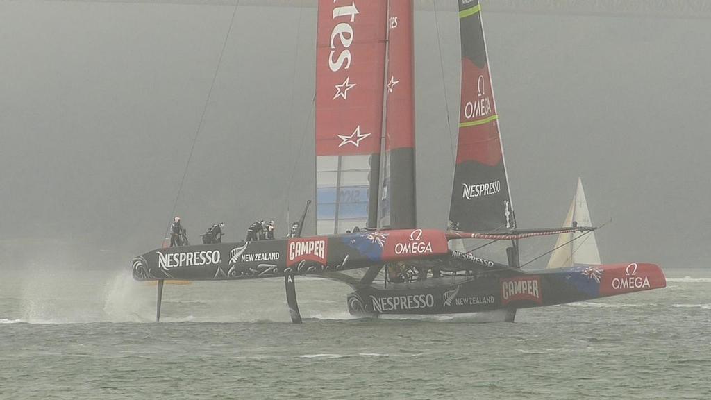 Emirates Team NZ sailing in the fog, Final Day, Louis Vuitton Cup photo copyright John Navas  taken at  and featuring the  class