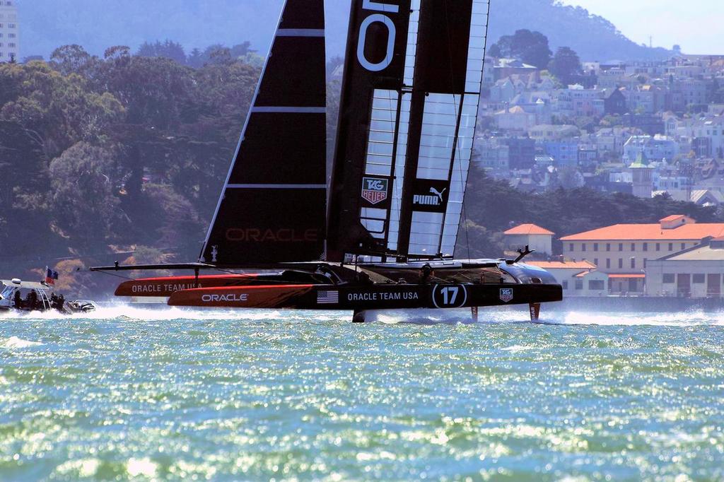Boat two speeds by Fort Mason on her foils ... - America’s Cup 2013 © Chuck Lantz http://www.ChuckLantz.com