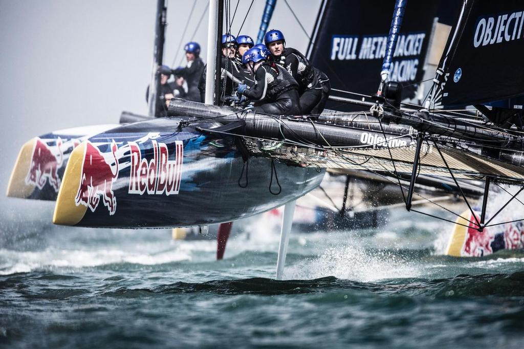 Team members of Objective Australia perform during the speed trial of the Red Bull Youth America’s Cup in San Francisco, California on August 31, 2013. © Balazs Gardi / Red Bull Content Pool