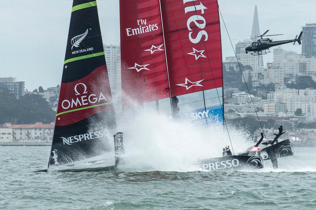 Emirates Team New Zealand bury the bows in the bear away at the top mark in their first race of the Louis Vuitton finals against Luna Rossa Challenge. Rob Waddell and Chris Ward were lost over board.17/8/2013 photo copyright Chris Cameron/ETNZ http://www.chriscameron.co.nz taken at  and featuring the  class